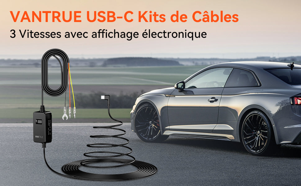 Kit de câblage VP05 USB-C à 3 vitesses avec affichage électronique, posé devant une voiture coupé grise